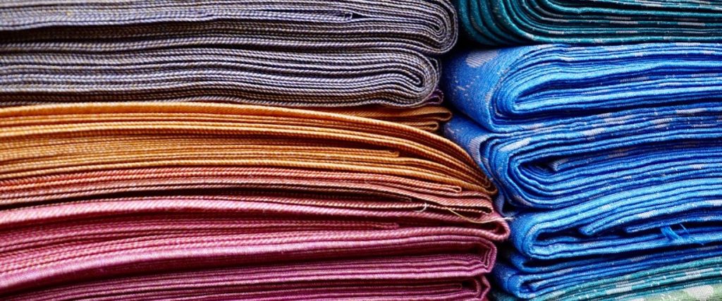 stack of colorful fabrics